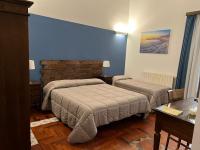 Camera Tripla con Balcone