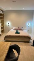 Studio piscine partagée parking securisé - Ferienwohnung