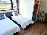 Kleine Tweepersoonskamer met 2 Aparte Bedden