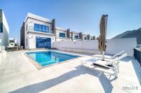 B&B Fujairah - High-end 4BR Villa with Assistant’s Room Al Dana Island, Fujairah by Deluxe Holiday Homes - Bed and Breakfast Fujairah