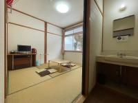 Chambre Simple avec Salle de Bains Commune
