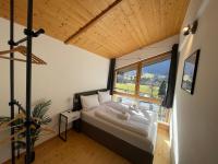 B&B Montafon - homy Alpine Deluxe Chalet in St Anton im Montafon - Bed and Breakfast Montafon