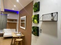 NA Suites at Pine Suites Tagaytay - Chambres d’hôtes Tagaïtaï