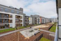Luxurious Grey Apartment with Sauna, Gym and Parking by Noclegi Renters - Ferienwohnung