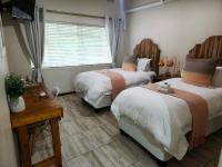 Tweepersoonskamer met 2 Aparte Bedden