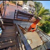 Apartamento aconchegante com deck - Chambres d’hôtes
