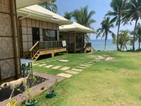 B&B Burgos - Villa Malinao Oceanview Resort - Deluxe bungalow - Bed and Breakfast Burgos