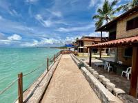 A private chale less than 20 feet from the ocean - B&B