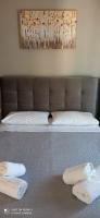 Cosy Apartment in The Heart of The City - Chambres d'hôtes Kalamata