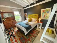 B&B Plettenberg Bay - Calm Waters Guesthouse: Robberg Room - Bed and Breakfast Plettenberg Bay