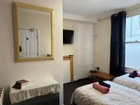 Tweepersoonskamer met 1 of 2 Bedden en Eigen Badkamer