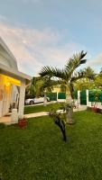 Luxueuse Villa - Jardin - Piscine - Jacuzzi - 3min du lagon - Ferienwohnung