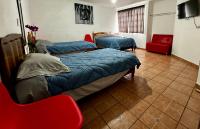 Camera Quadrupla con Bagno in Comune