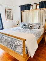 Zimmer mit Queensize-Bett und Gemeinschaftsbad