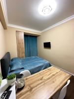 1-комнатная квартира в новом ЖК возле Центрального стадиона - Chambres d'hôtes Almaty
