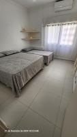 Apartamento pé na areia Guarujá 3 quartos 3 banheiros sala cozinha equipada - Chambres d'hôtes Guarujá