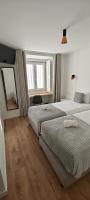 Tweepersoonskamer met 2 Aparte Bedden