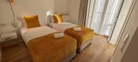 Tweepersoonskamer met 2 Aparte Bedden en Balkon