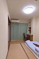 Tweepersoonskamer in Japanse Stijl met 2 Aparte Bedden en Gedeelde Badkamer