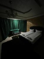 Chambre Deluxe (1 Adulte + 2 Enfants)
