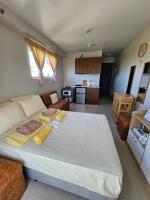 B&B Suba - Saekyung Village 1 Phase 3 Condo with Side Window and Balcony - Bed and Breakfast Suba