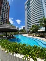 Flat com VISTA de CINEMA para Praia da BARRA da Tijuca - 5 min da PRAIA - Ar Condicionado, Portaria 24h, Wi-Fi 500 Mbps, Piscina, Academia, Sauna, Quadra de Tênis - B&B Río de Janeiro