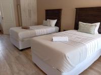 B&B Klerksdorp - AMANI PALMS GUEST HOUSE - Bed and Breakfast Klerksdorp