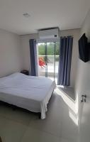 Quartos Confortáveis em casa compartilhada - 5 min Aeroporto Internacional - B&B