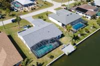 Waterfront Escape with Wild Owl Charm, Heated Pool & Pet-Friendly - B&B Cape Coral