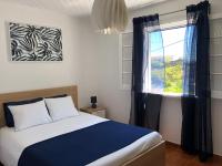 B&B Caloura - WelcomeBuddy - Uma Casa na Caloura - Blue & Beach - Bed and Breakfast Caloura