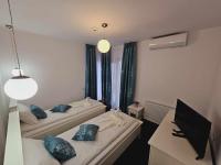 Tweepersoonskamer met 2 Aparte Bedden