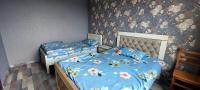 Chambre Triple avec Salle de Bains Commune