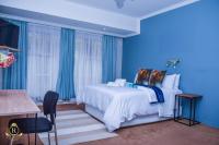 Zimmer mit Queensize-Bett und Gartenblick