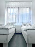 Piccola Camera Matrimoniale/Doppia con Letti Singoli