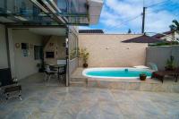 Casa c/piscina á 15 minutos Parque Beto Carreiro e 300m da praia Navegantes - Chambres d'hôtes Navegantes