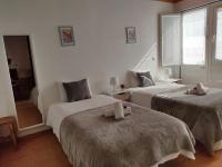 Habitación Doble con baño privado externo - 2 camas