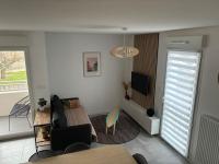 Spacieux appartement neuf au cœur de Bisca plage - Bed and Breakfast