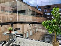 Kotimaailma Apartments - Moderni parvekkeellinen keskustakaksio - Rongankatu - Chambres d'hôtes Tampere