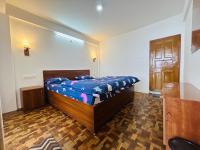 Camera Matrimoniale Deluxe (2 Adulti + 1 Bambino) 