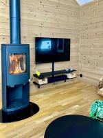 Cozy cabin on Sjusjølia by the trail network sauna - B&B Ringsaker