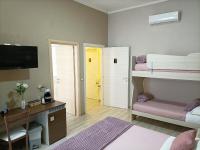 Quadruple Room with Private Bathroom
