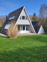 Nurdachhaus Zeltdachhaus Damp - Ferienwohnung Damp