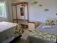 Dreibettzimmer mit Gartenblick