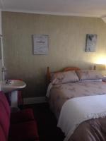Economy Quadruple Room with Shared Bathroom