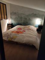 Logement cosy Sous Les Toits - Ferienwohnung