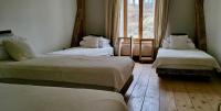 Chambre Quadruple avec Salle de Bains Commune