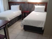 Tweepersoonskamer met 2 Aparte Bedden