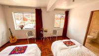 Chambre Lits Jumeaux avec Salle de Bains Privative