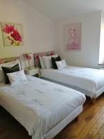 Zweibettzimmer mit Gartenblick