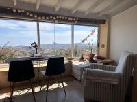Casa con vistas al mar y Patio de Buganvillas - B&B Aigües